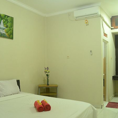 Budget Door Legian Inn Кута Экстерьер фото